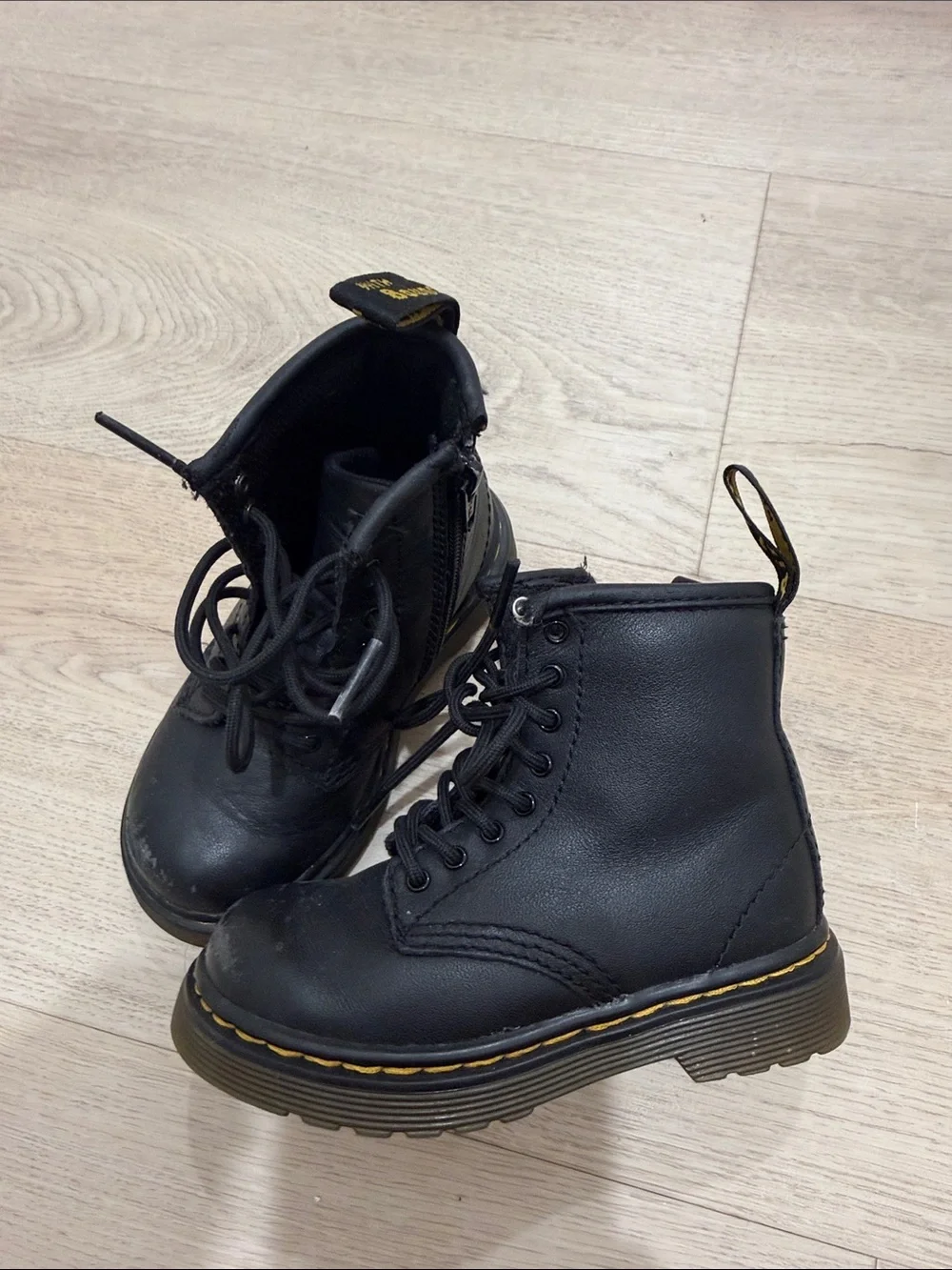 Dr. Martens Kids Black Leather Lace-Up Ankle Boots with Yellow Stitching